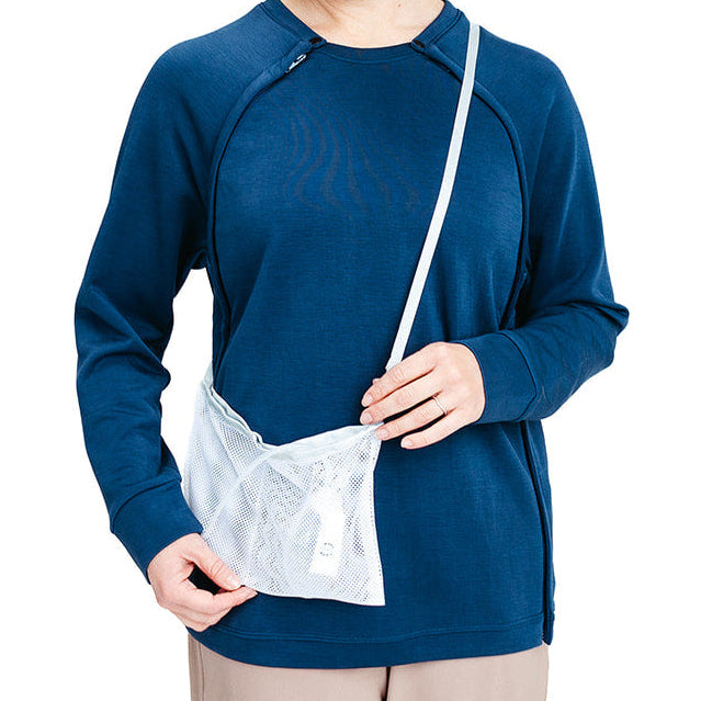 Woman wearing a Shower Drain Holder with a JP drain.  